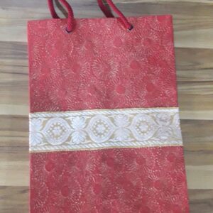Red self design with lace